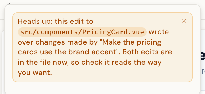 The overwrite warning banner naming Button.vue and the other chat that wrote it